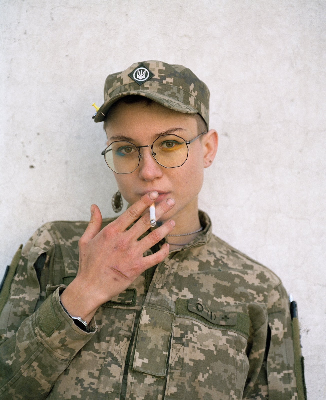 Kafa smoking in their Ukrainian military fatigues.
